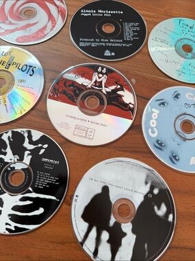 Assorted Alternative Rock CD Lot with Colorful Disc Artwork